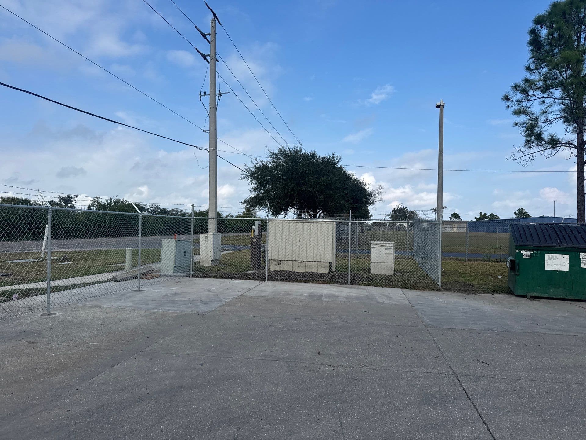 Commercial chain-link fence around a utility pad, Bradenton–Sarasota–Manatee market