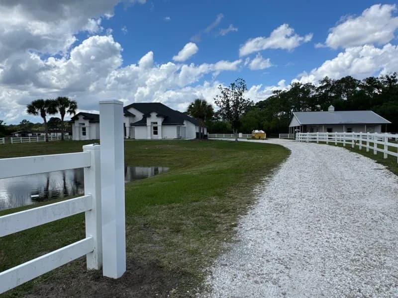 White vinyl fence and driveway gate, ASAP Bradenton install