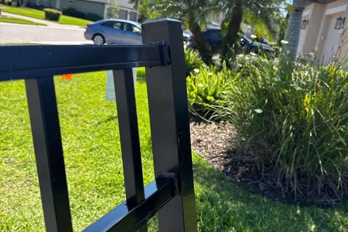 Black aluminum fence and gate at a Bradenton home, ASAP install